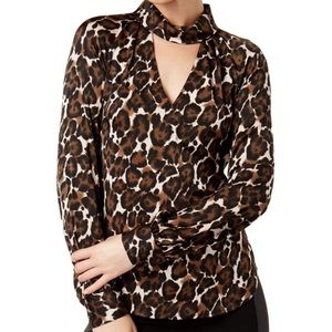 Trina Turk silk animal print top with keyhole neck. Size small.